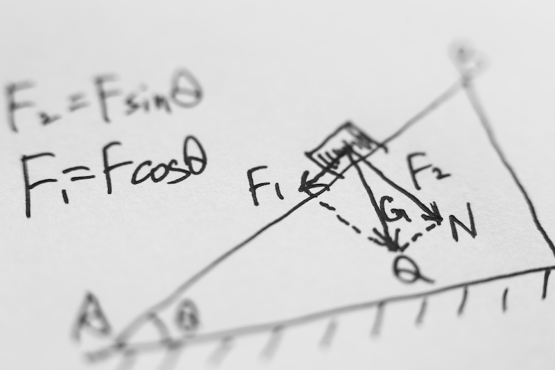 handwritten force calculations with diagram drawing